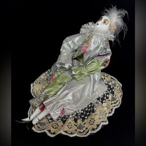 Vintage Musical Harlequin Clown Doll on Pillow that Twirls with Music 11”